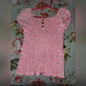 Cute casual girls top very stretchy never worn.size 10/12